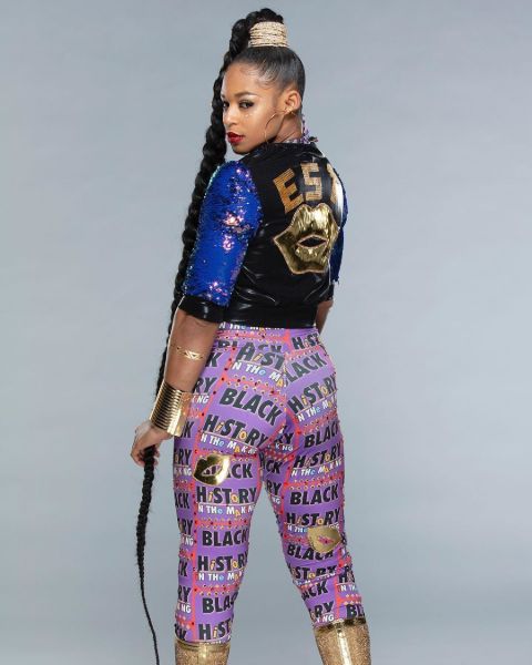 Bianca Belair poses for a picture in a photoshoot.